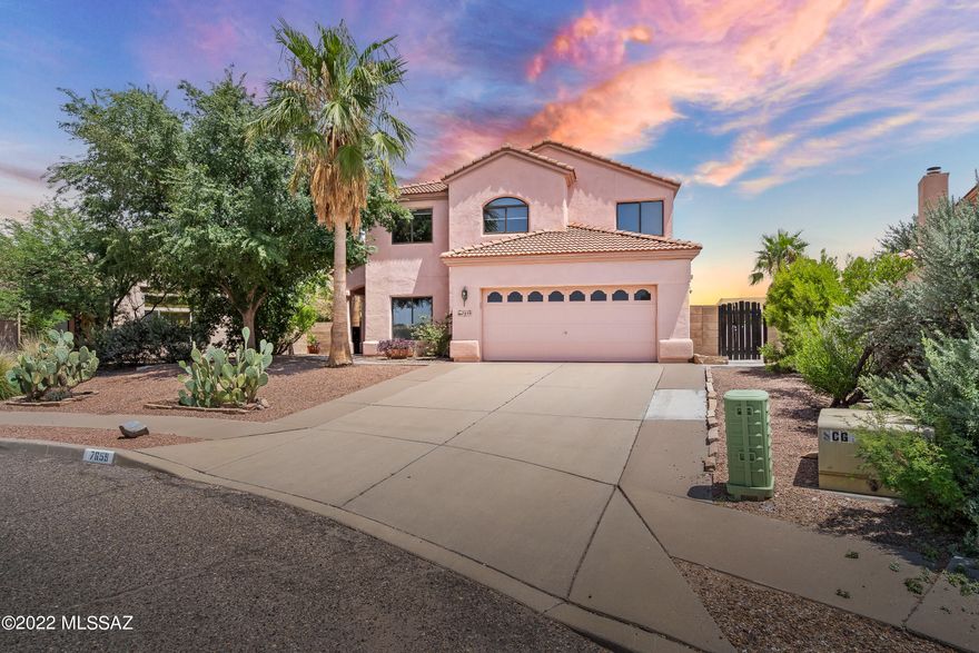 SELLER'S SAID ''GET IT SOLD!'' All offers considered! $100,000 price reduction on this move-in ready 4-bedroom, 3 full baths family home, w/a den, sparkling pool, relaxing spa, & artificial turf for the kids to play!  Newly painted interior T/O, including the garage with loads of cabinet storage space!  The large eat-in kitchen includes 2 wall ovens, 2 large microwaves, & a large kitchen island.  A family/game/rec room with a cozy fireplace, & an extra-large formal dining room.  The huge upstairs master suite includes an oval tub, separate shower, giant walk-in closet, & a sitting deck to enjoy coffee & mountain views!  A new 30-year tile roof, 2 large newer air conditioners, a new hot water heater, a new pool pump w/ 4 new filters, new window blinds in the living room, ceiling fans T/O m & reverse osmosis water systems make this home perfect for the family!  All appliances included!  Plus, it is close to major hospitals, doctor offices, shopping, restaurants, & Udall Park!  An 8-month American Home Shield Warranty policy is included!  What's not to like?  Show & sell!