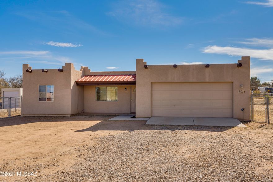Sellers will accept/counter offers between $151,500 and $166,500.  Terrific 3 Bed/ 2 Bath southwestern home on a large lot ready for new owners. This 2005 home has tile in all areas except the 3 bedrooms which are nicely appointed with a neutral carpet.  Kitchen has a sizeable breakfast bar, spacious cabinets, all appliances and a picture window overlooking  the serene backyard. Bathrooms are lovely and have tile surrounds in the showers/baths.  Counters are also tiled for a custom look.  Master Bedroom has a supreme walk-in Closet and all bedrooms have ceiling fans.  This house has a GORGEOUS mountain view from the front porch area with plenty of room out front to create a beautiful courtyard if so desired.  Close to I-10 for easy commuting to Tucson or Sierra Vista. Come make this Home!