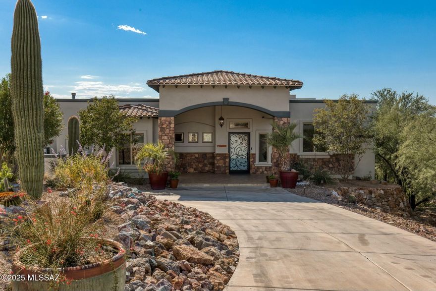 This Is A Desert Masterpiece: Comfortable, Casual Luxury Living In The Sonoran Desert with the BEST SUNSET VIEWS!

Truly an extraordinary, timeless sanctuary nestled on 3.3 acres in the heart of Tucson's breathtaking landscape. This 5 Bedroom/4 Bath custom-built estate combines contemporary elegance with the raw beauty of the Sonoran Desert, offering a private, resort-style retreat designed for the discerning buyer. Perfect for any phase of life: growing families, multi-generational living, those who work from home, corporate housing, international clientele. Curate an exceptional lifestyle with breathtaking mountain AND unparalleled sunset views, a vibrant desert botanical garden. An enchanting ambiance that celebrates Tucson's natural splendor.