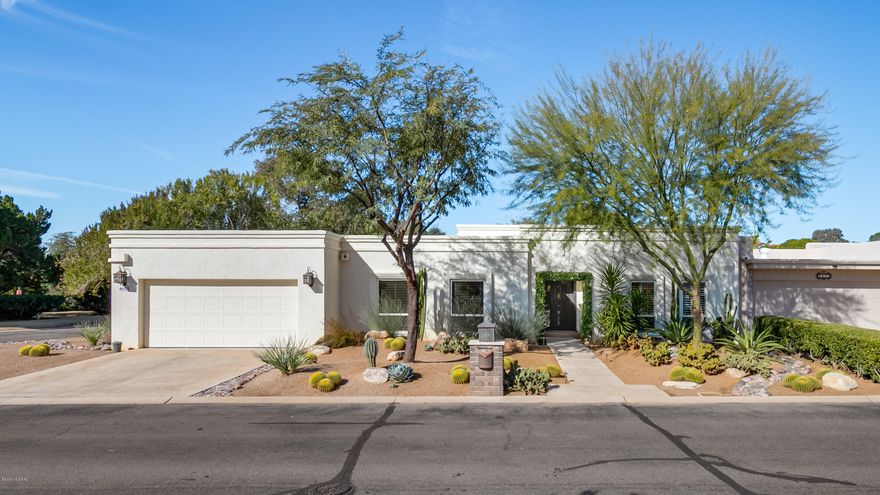 Casas Place was an extensive remodel down to the frame by Sanctuary Custom Homes in 2015. Custom iron entry doors open to the fabulous Great room concept with 12' ceilings. Travertine flooring throughout except for bedrooms. New soft close Alder cabinetry throughout.  Expansive Red Dragon Granite island highlights the kitchen. High end stainless steel appliances for your cooking pleasure. Baths offer large step in showers, Travertine & marble tops. Media room/den offers a wet bar, ice maker plus 2 Murphy beds provide comfortable overflow guest sleeping. 2 car plus garage offers golf cart storage with separate entry door, built in storage, plus fridge conveys. Travertine patio tiles, astro turf and citrus highlight the spacious back patio/yard. Water softener & AV equipment does not convey