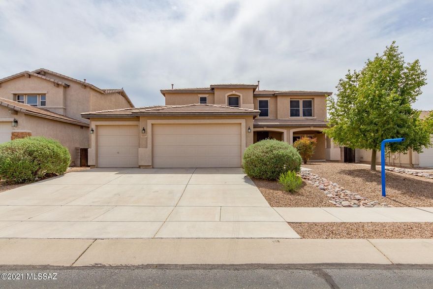 This is a must see home with features galore! It has a great room floor plan, that has warm open spaces for everyone. The kitchen features spacious countertops and stainless steel appliances including an island and eat in area. The first floor living room offers a den and formal areas The second floor opens to a large loft with endless possibilities. The master bedroom is spacious and boasts a huge walk in closet and spa like bath, patio with views. Three additional bedrooms and a bath on this floor. Backyard is complete with outside kitchen and peaceful sitting areas. This home is ready for you.