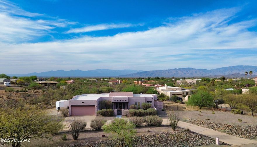 Tranquil oasis with north facing majestic mountain views. And with a possible VA loan assumption, these views could cost thousands less! Circular driveway off quiet cul-de-sac with no HOA and over an acre of room for any hobby or toy. Inside there's a split bedroom plan with a separate dining room and an office. A huge Arizona room on the back porch provides a great place to enjoy the views in shaded comfort. There's even a giant chicken coop and storage shed! The well appointed primary will not disappoint and open concept living areas have both great sightlines and capture the natural beauty of the north facing back yard and the mountains beyond. Pride of ownership throughout, this oasis - close to all the necessities yet far from stress - is ready to be your home!