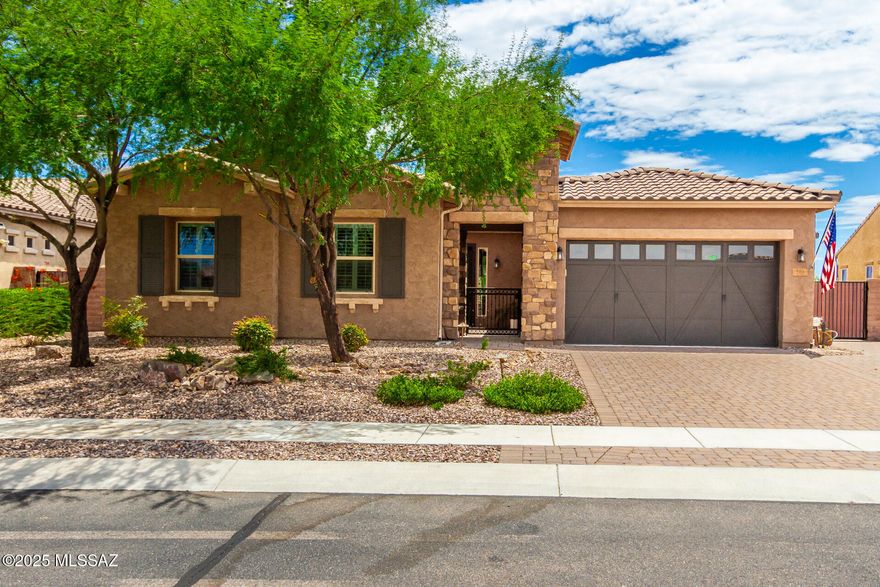 Amazing home with Unobstructed mountain views from backyard facing OV Nature Preserve.  Solar(paid in full) w/ extra panels. Large Great Room,  Chef's kitchen w/ oversized Quartz Island including gas cooktop, separate icemaker and beverage center.  Front bedroom would make wonderful 2nd Primary or guest quarters, oversized (double) bedroom with pulldown  bed. Iron security front door w/front gated courtyard. Mature fruit trees and established veggie garden. Firepit, built in BBQ w/ pergola. The interior has Ceiling fans with hidden up light. Central vacuum system with toe sweep in kitchen, and a two stage air conditioning system. Plantation shutters and blinds all stay.  California Closets are in all  bedrooms. Delightful gated community with sparkling pool, spa,  large splashpad and park