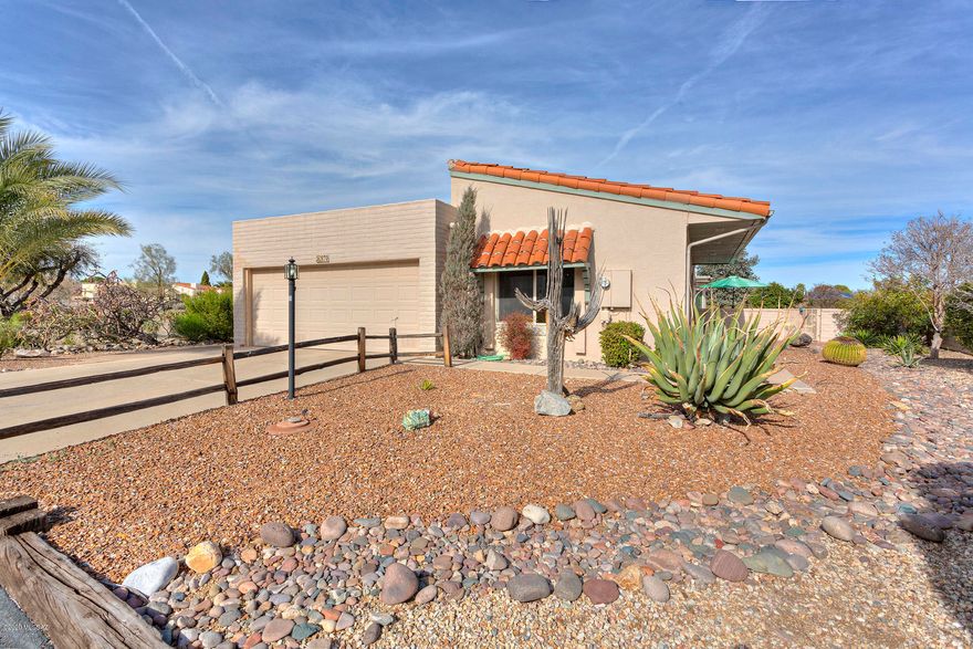 BEAUTIFUL CORNER LOCATION W/VIEWS IN DESERT HILLS 2, A SINGLE FAMILY RESIDENCE. ADDED SQUARE FEET W/ENCLOSED & MARVELOUS ARIZONA ROOM. GORGEOUS VIEWS OF SANTA RITA MTS INSIDE & OUT OF THE HOME. STEP INTO THE FOYER ROOM/ATRIUM FOR NATURAL LIGHT. KITCHEN W/STAINLESS FRIG, IN KITCHEN DINING AREA. ROOMY LAUNDRY AREA W/PANTRY & ALL APPLIANCES INCLUDED. UPGRADES TO THIS HOME  ADDED LOVINGLY BY SELLERS, NEWER PELLA WINDOWS, MASTER ENSUITE UPGRADES, NEWER ROOF COAT & NEWER HEAT PUMP 2019 & WATER SOFTENER. 2 CAR GARAGE HAS SPACIOUS STORAGE CLOSET. BACKYARD IS GATED, PRIVATE & BONUS SPACE FOR A DOG RUN. BEAUTIFUL FLAGSTONE PATIO/PAVER AREAS. PRIVATE AREA FOR MORNING COFFEE/COMMON AREA BORDERS ON WEST SIDE OF HOME. NO HOMES DIRECTLY BEHIND. DO NOT MISS AN OPPORTUNITY TO MOVE INTO THIS BEAUTIFUL HOME.