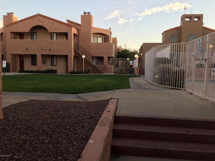 Charming and freshly updated!  New Tile throughout, fresh paint and baseboards.  Stainless steel appliances and covered parking. One of the few units in Copper Star that has a backyard as well as a new paver patio!  Gated Complex and walking distance to stores and restaurants. Pool, Spa, workout room, water and trash included as well as basic wifi.  Great property for U of A student, investor or your new home!  A peaceful home in the middle of town.  Complex is currently in the process of being painted with most buildings done and this building will be next!