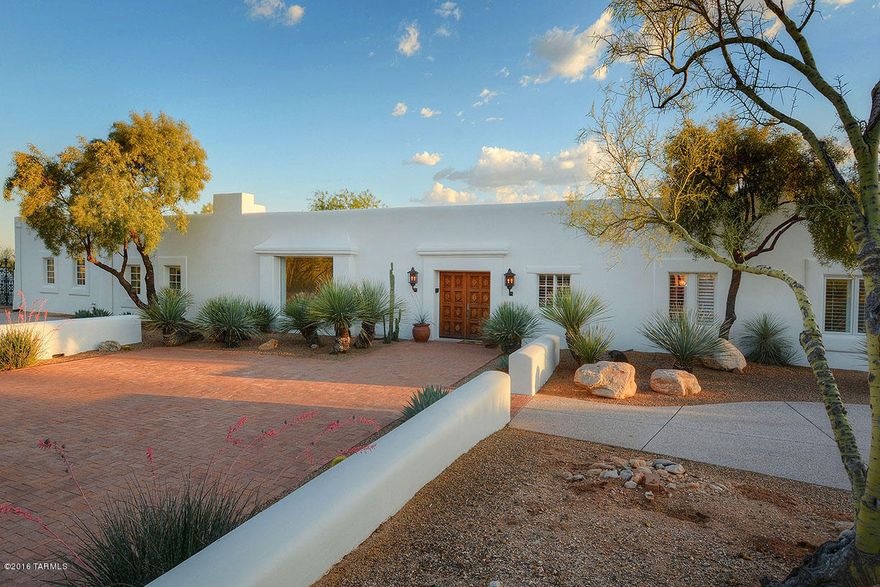 AN ARCHITECTURALLY SIGNIFICANT ESTATE, PRIVATELY GATED, SITUATED ON OVER 6 ACRES DESIGNED BY CELEBRATED ARCHITECT JOSIAS JOESLER. TASTEFULY REMODELED TO PRESERVE AND PROTECT THE ELEGANCE, GRACE AND CHARM, ARTICULATING THIS ROMANTIC REVIVAL SYTLE. FEATURING CLASSIC HAND CRAFTED DECORATIVE MOTIFS AND BOASTING 7,282 SQFT (INCLUDES 1,629 SQ FT GUEST HOUSE), 5 BDRMS, 6 BA’S, 800 SQFT STUDIO/CHILDREN’S WING, OFFERING BOTH A TRANQUIL RETREAT FOR INTIMATE FAMILY LIVING OR GRAND ENTERTAINING. A LARGE PICTURE WINDOW IMPECCABLY FRAMES THE CATALINA MTN'S UPON ENTRY, FLANKED BY A WALL OF GLASS, OVERLOOKING THE QUINTESSENTIAL POOL AREA W/ AMPLE SPACE FOR LOUNGING AND AL FRESCO DINING, PROVIDING YEAR-ROUND ENJOYMENT OF THE SONORAN DESERT’S INDOOR-OUTDOOR LIFESTYLE. (SEE FLOORPLAN UNDER DOCUMENTS TA