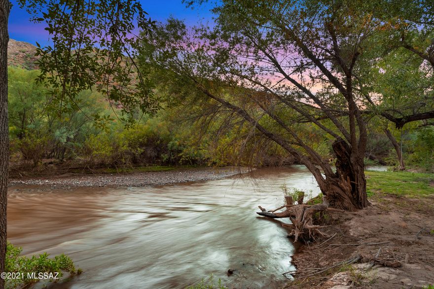 Tucked away is your dream come to life. Wake up to the tranquil sound of the Gila River right off your front porch. River cabin is 2 bedroom and 1 bath with full kitchen and living area. Steps away from the river that flows right through your property. Take a stroll to the other 2 cabins in the upper part of the property. The Garden Cabin is 385 sq ft with it's own kitchen and dining area. Stroll the wood deck walkway to the Cowboy cabin, 352 sq ft with washer, dryer and full bathroom. Want to throw a barn dance? Plenty of room in the 60 x 120! ''His'' side set up with tools and tractors, ''Her'' side set up as a parlor and game room. Outhouse built off the breezeway with Men's room and Women's room. This private ranch sits on over 70 acres an hour away from Tucson and Phoenix. Cick MORE Did I mention it's off grid? Owned solar and private well! Zoned multi use so this property can be your own private family compound or turn it into an amazing wedding venue, retreat, short term vacation rental, winery, RV hosting property, the possibilities are endless! Please see attached video. Must be shown with seller present.