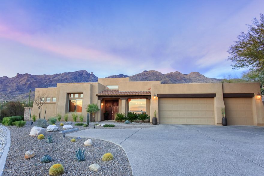Excellent home in District #16. Popular gated neighborhood, Paloma Canyon! PRIME North Foothills location close to schools, shopping, and restaurants. Great Room floor plan with grand views of the Catalina Mountains and Finger Rock from inside as well as out!  You will love the beautiful stone floors, and large gourmet kitchen with granite counter tops and stainless steel Bosch appliances. Lovely master bathroom has jetted tub and modern walk-in clear glass shower. North facing fun backyard with spectacular Mountain views perfect for entertaining and activities. Enjoy the covered patio, heated pool & spa with waterfall feature, synthetic grass, and hardscape pavers area perfect for ramada or sport activities. Immaculately maintained home! See this one fast...it won't last long!