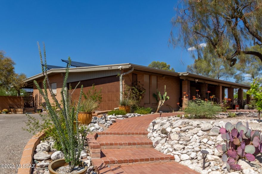 Beautiful foothills property on a huge .65 acre corner lot. Well-maintained 3 bedroom, 2 bath home with newer roof and AC. Large primary bedroom has patio access. Luxury primary bath features: slate tile, granite countertops, dual sinks, high end custom cabinetry, roman shower.  Gourmet's kitchen features a center island, stainless steel appliances, and an induction stovetop. Formal dining room. Plantation shutters, removable heat-reducing window screens, and newer energy conscious appliances maximize energy efficiency and reduce water usage.  Mountain views from the resort like backyard &  large covered patio. Pool heated via a passive solar water heater. Prepaid PV solar system supplies most electrical needs.  Rainwater harvesting system. Additional notes and amenities:

-Solar for house: This is a pre-paid lease that will provide free
electricity for most of your electrical needs for 9 more years! The
buyer will need to transfer the lease to their name but it doesn't
have a monthly payment (since it's pre-paid). The transfer is required
to keep the production guarantees for the system and the service
warranty for the system (Sun Power makes repairs for free if something
wears out). The system was installed in late 2012 and the lease is a
20-year lease, so the lease will end in late 2032.

-There is a great built-in sound system that covers the back porch,
kitchen and living room. We are leaving the tuner, the speakers, and
the switching box so that you can play music in any or all three of
those places. Its great for parties and entertaining or just a fun day
at the house.

-All closets have California Closets closet shelves and rack. The MBR
closet has a pull out clothes bar for drycleaning, and tie and belt
racks as part of the closet. All are adjustable. The MBR cabinets have
laundry basket spaces for 3 baskets.

-The first bedroom has built-in California Closets shelving and cabinets.

-The Kitchen Craft cabinets in the kitchen have quick release hinges
to make adjusting shelves very fast and easy. There is also a
German-engineered heavy-duty rack to the left of the induction range
that lets you store heavy pots and pans in the corner of the cabinets.
Pull it open to check it out!

-The stamped concrete floors are easy to maintain and if you knick
them, there is an easy solution to repair small knicks. They won't
crack like a tile, but to most people look like tile.

-Several bathroom and kitchen cabinets have magnetic locks on the
doors to child-proof medication, cleaning supplies, and other things
you don't want kids or guests to access. If a cabinet doesn't open, we
have it locked currently but we could unlock it for inspections, etc.

-There are two independent cable/high speed internet lines run to the
house, both updated during COVID. This allows you to choose which to
activate, or to maintain a business line and a personal line.

-The master bedroom is supposed to be able to be used as a tub,
although we have not used it as a tub so we have listed it as shower
only.

-The gas line is run so that the line/pipe you are responsible for is
at the house's edge while the line that the gas company is responsible
for runs across the property, reducing the owner's exposure to any
repair costs across the life of the house.