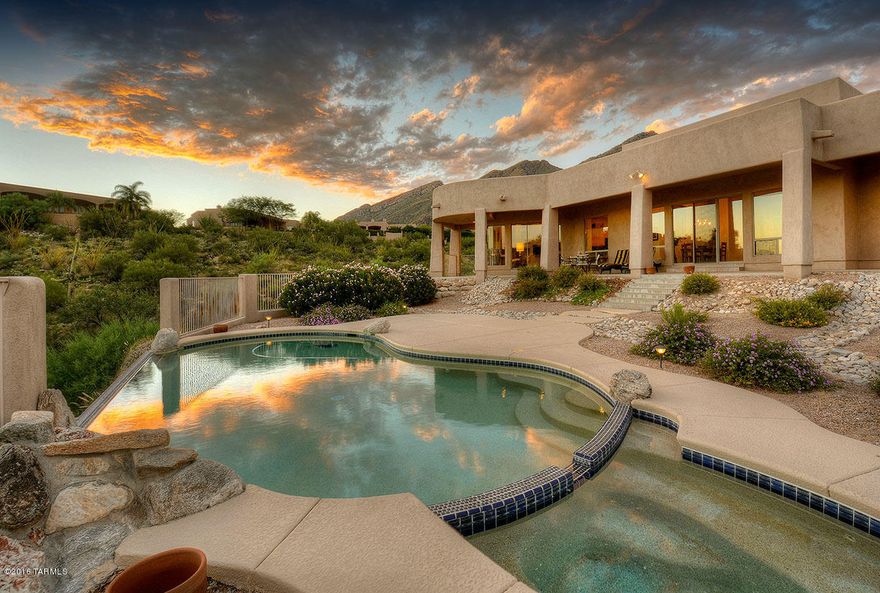 Breathtaking City Lights and Catalina Mountain Vistas--Prime VIEW lot in Alta Vista! Stunning soft Contemporary was built by GDV Custom Homes for its owner as their Second Home-Clean Lines-Fabulous Floor Plan-NO interior steps-Den and Beautiful Master Suite are Split from other 3 Bedrooms and Baths-Window Walls Allow Great Light + all of that jaw dropping View into the home! Spacious Master has Fireplace,Luxurious Tub-with a City View! Glass Block Shower with Dual Shower Heads-Huge Closet. Kitchen Opens to a Super Family Room w/Gas FP-
 Negative Edge Pool and Spa-Borders Common Area-Amazing Architecture-North/South Orientation-At the End of a Cul de Sac Street-Enormous 3 Car Garage-Aggregate Circular Drive-Stacked Stone Detail-Simply Impressive! Floor Plan is under Document Tab.
