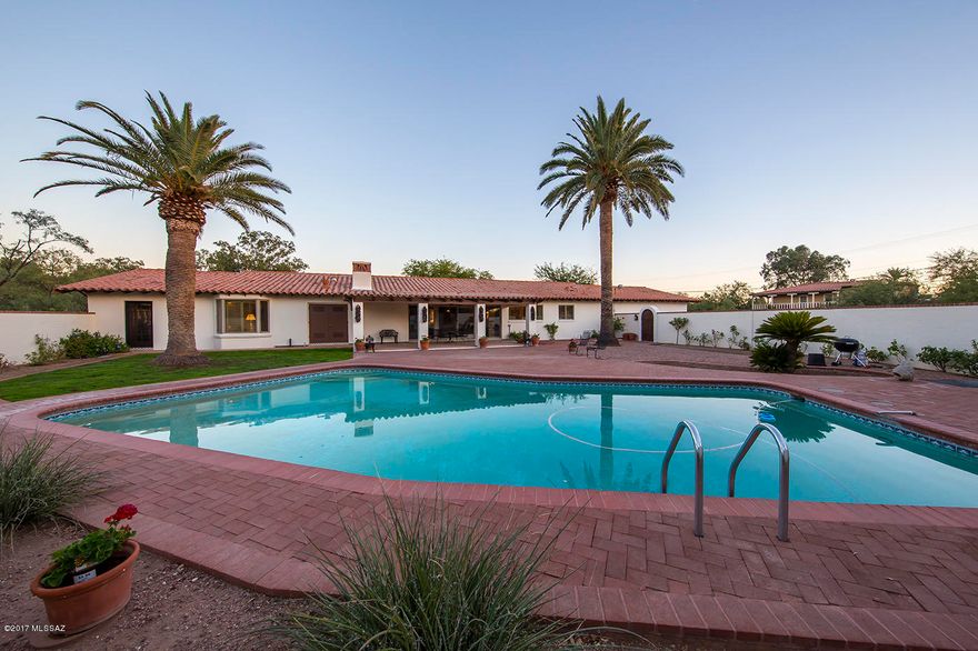 ''Exquisite Slice of Tucson History''. Designed by Iconic architect,Anne Rysdale. Located in sought after Historic Colonia Solana,beautifully sited on 1.12 acres of land. Located just north of Reid Park,w walking & bike path.  Golf,tennis,play areas, band shell concerts, and U of A Baseball. Convenient to Downtown,U of A,Restaurants,Shopping, & everything you could want. A dream location for Native Tucsonans & lucky transplants. Every inch of this home has been lovingly ''made new'' by the current owners. No detail overlooked. It began with a new clay tile roof & went forward from there. floor-plan, Every selection & improvement was thoughtfully chosen. The owners kept the original charm & character while making it shine! Room for a guest house, storage etc.