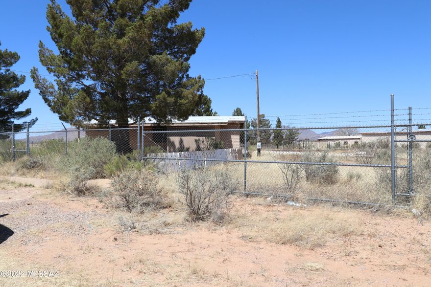 Prime Commercially zoned  property in Whetstone AZ.  460 ft of frontage on State highway 90. 9 lots. 2.52+- total acres.  Includes 850 sq ft office/retail building, 2 aluminum alloy modulars, 5,000 sq Ft Equipment Maintenance storage approx. 30 ft high. Enclosed by Chain Link Fence topped with barbed wire, 3 gates and 2 slide gates. Concrete slabs/docks can use for showing/display, Grandfathered billboard. City Water is available plus residential well on property. Two septic systems on property. Whetstone is near Sierra Vista, Tombstone, Benson and Tucson.  Property includes 106-21-026A, 029A, 031A, 033B, 034A