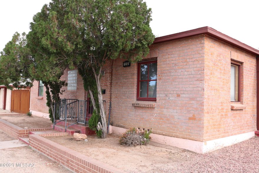 Lovely one bedroom, one bath duplex.  with an extra room that could be used as a 2nd bedroom.  Fireplace is NON-FUNCTIONAL, Candles ONLYS. Automatic metal window shades on east facing window.  wood flooring , updated kitchen!  AC and forced air gas heat. Nice floor plan, shared garage/ laundry facilities.  Pets considered, there is a large yard. One car garage.