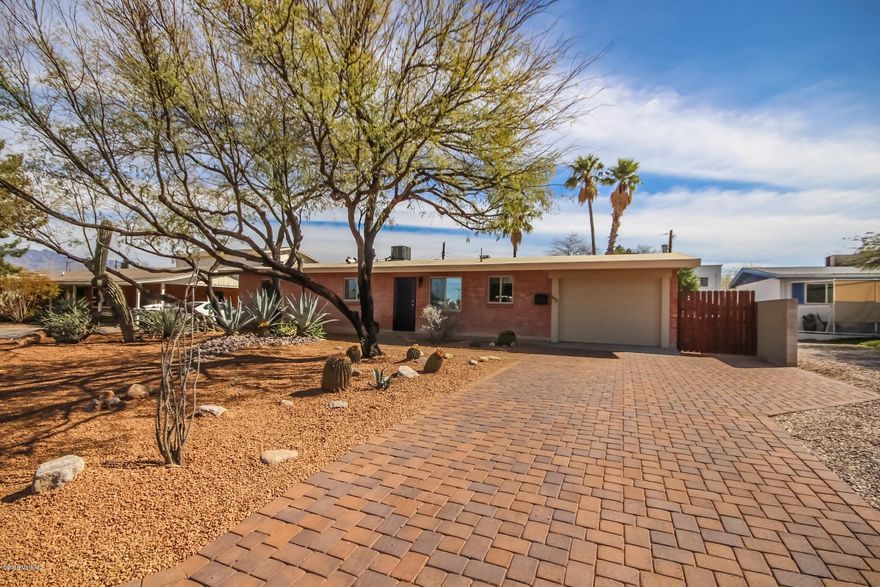 Completely renovated, 1956 3/2 brick ranch w/600 SF Renovated Casita. Close to Green Reid Park, El Con Mall, Banner MC & Uof A. Upgrades: High End American Standard HVAC, w/a split unit in Casita. New plumbing & electrical, dual pane windows, bathrooms w/ Carrara marble counters. The Kitchen has new Samsung SS appliances w/ gas cook top. Beautiful 3cm Quartz countertops w/ breakfast bar. The Cabinets are 42'' Cherry Kraftmaid, soft closing and a pullout pantry. Bedrooms & Kitchen have beautiful blackout roller shades. Wood burning fp, Cobblestone brick driveway, Large private block wall back yard, mature grapefruit & pomegranate trees and a fire pit. There is also a ''River Rock Pond''. The casita has its own private entry and outdoor space. A hard to find, turn key property.