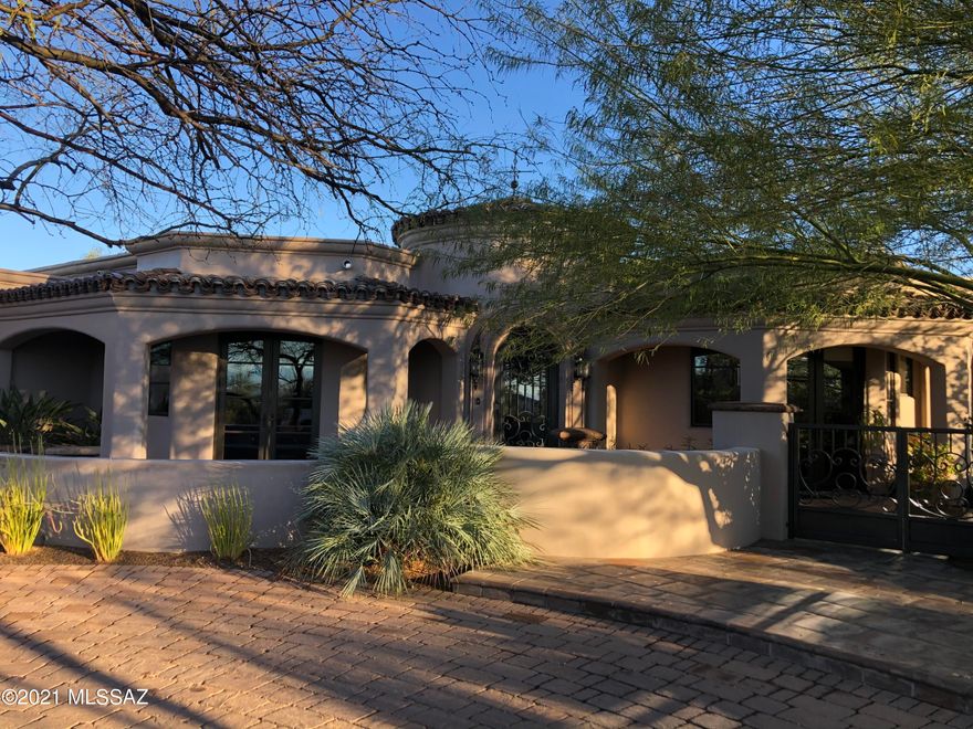 Stunning Spanish Mission style home in coveted Hacienda Del Sol Estates. Four bedrooms, office, or fifth bedroom, four and a half bathrooms, over 4100 square feet. The finest appointments throughout. Amazing pool/spa.