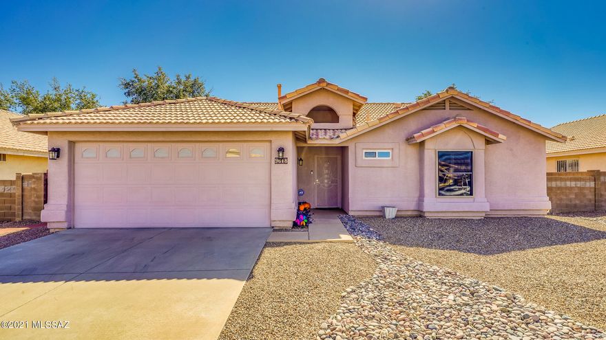 PRIDE OF OWNERSHIP truly shows in this stunning 3 bedroom, 2 bath home + BONUS RM/OFFICE/DEN. Many wonderful features throughout including a spacious kitchen w/ STAINLESS STEEL APPLIANCES & BRAND NEW Kenmore Elite FRENCH DOOR REFRIGERATOR (conveys), glass cooktop stove, cabinets w/dual pull outs,  GRANITE COUNTERTOPS & breakfast bar. Open concept living area w/ VAULTED CEIILING wired for surround sound. Bedrooms w/ WALK-IN CLOSETS, ceiling fans & DUAL VANITIES in both full bethrooms. HUGE MASTER SUITE w/ BONUS ROOM with separate MINISPLIT HEATING/COOLING. The sun screened ENCLOSED AZ ROOM has epoxy floor & Tommy Bahama fans, great spot to enjoy the hot summer months in comfort. HUGE BACKYARD w/ SHED (conveys), WHOLE HOME HUMIDIFIER SYSTEM, NO CARPET THROUGHOUT, TRULY A MUST SEE!!