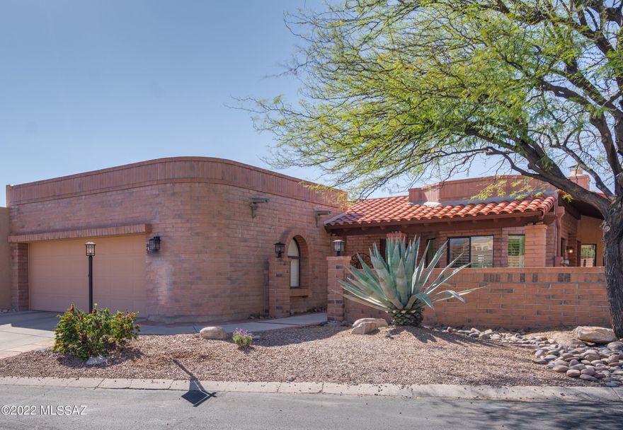 Views on three sides, from the enlarged front courtyard, side & back covered patios & yard. Beautiful modern concrete floors except in bedrooms. Love the lavish primary bath with large shower, stunning granite and new cabinetry, blt-ins in the oversized walk in closet. Newer black appliances, granite in kitchen. Plantation shutters on most windows. High ceilings w/new LED lights in LR/DR with 8 ft sliders out to the views. Cozy/Beehive FP for cooler weather. Beside the 3 bedrooms there is a wonderful office nook off the primary bedroom...both of you can work at home in your own private spaces! This Fairfield community has 2 pools, 2 spas, 2 tennis courts & clubhouse! Welcome home!