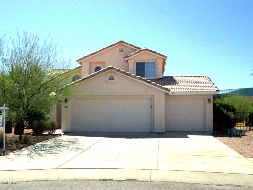 Beautiful 4 Bedroom 3 Bath home located on Large Premium Lot on Quiet Culdesac. Freshly Painted Interior and Exterior. Bright Open Floor Plan with Lots of Windows for Natural Light,  Soaring Ceilings and Tiled Floors. Downstairs features Large Living Room and Formal Dining Room. The Kitchen has Breakfast Bar, Pantry and Breakfast Nook with the Bay Window and Opens up to the Large Family Room. Downstairs has One Bedroom and Full Bath. Upstairs Features Terraced Hallway overlooking the Living Room and Family Room. Master Suite has Bay Window with Mountain Views. Master Bath with Dual Sink Vanity and Two Walk-in Closets, Soaking Tub and Separate Shower. Large Backyard with Mature Shade and Citrus Trees, Planters and Plenty of Room for a Pool. 3-Car Garage. Award Winning Vail School District.