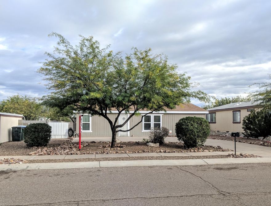 Freshly updated great starter home with lots of privacy out your back door.  AC is less than 1 yr old.  New mat grey appliances, flooring, lighting, ceiling fans, lighting fixtures, duel pained windows, door knobs, toilets,vanities and tape and textured walls.  Security system and security screens on both front and back door for peace of mind. This back yard is a private sanctuary to relax and enjoy with or without company.  It will be an extension of the home. Come take a look. You will love it! OWNER AGENT