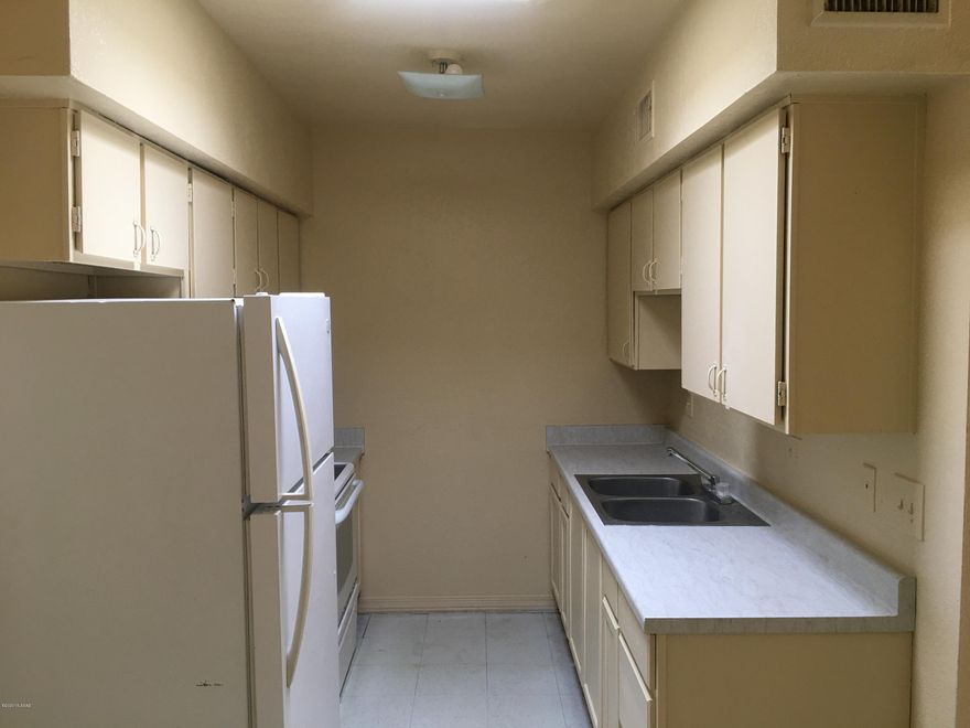 Four 2 bedroom 1 bath units with large living rooms adjacent to dining areas. Galley kitchen. possibility for coin operated laundry in common storage unit. Room to raise rents.