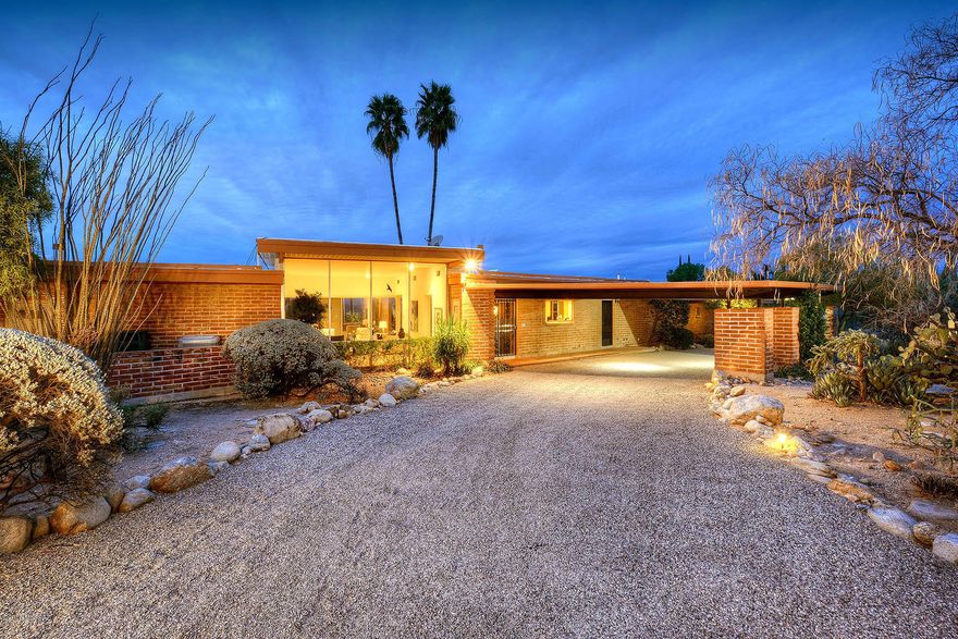 When we say ''Mid-Century Modern, this IS A CLASSIC 'MID-CENTURY MODERN' in the heart of the Catalina Foothills at the end of a cul-de-sac on 3.16 private, dividable acres with commanding city or mountain views from every room.  Main house with 3,592 sq. ft. has 3 bedrooms (activity room with full bath and closet could be 3rd bedroom or 2nd master) and 582 sq. ft. guest house has 2 bedrooms.  Enter into living room with soaring 12’ ceiling, walls of windows, city and mountain views, formal dining room, remodeled kitchen with granite counters and stainless steel appliances.  Master bedroom offers, walk-in closet, dual vanities and spa tub.  Covered rear brick patio, pool, attached 3 car carport, detached oversized two car garage, shared well, District #16 schools. Close to La Encantada, Whole Foods, Trader Joes, Safeway, restaurants and shopping.  See to appreciate the character and privacy.