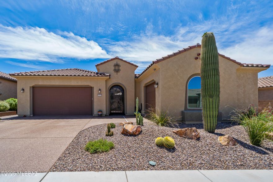 Beautifully upgraded Journey model featuring an inviting paver courtyard with a tranquil water feature and a custom iron entry door. Inside, you'll find a private guest en suite with its own living area—perfect for visitors or multigenerational living. The luxury kitchen is a chef's dream, complete with a large island, quartz countertops, upgraded cabinetry, stainless steel KitchenAid appliances, a walk-in pantry, and a built-in coffee bar. The spacious primary suite offers a spa-like retreat with an oversized walk-in shower, built-in seat,rain showerhead. Classy Closet custom built-ins in the primary walk-in closet provide ample, organized storage. Additional highlights include an upgraded laundry room with a sink and cabinetry, a 2-car garage plus a separate 3rd car garage, insulated doors, and Galaxy coating on the garage floors and driveway. This home also features a tankless water heater and an Aquasana water filtration system. Step outside to a southeast-facing backyard with an extended pergola for shade, sealed pavers, low-maintenance turf, and a view fenceideal for relaxing or entertaining. No corners were cut in this home with over $40,000 in builder upgrades. All located in a Del Webb community offering a fitness center, pool, spa, tennis, pickleball, bocce ball, and a variety of social activities.