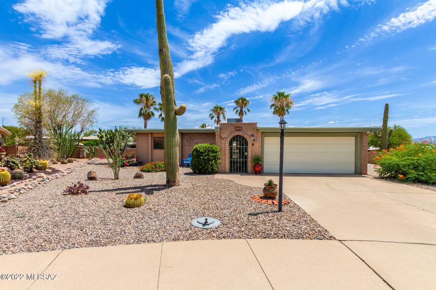 Beautiful contemporary remodeled home located in the quiet community of Colonia De Los Alamos-Villages, located in Green Valley, AZ. This home offers 2 bedrooms, 2 bathrooms, a 1,764 sq ft [open concept] floor plan, a well appointed kitchen with upgraded flat panel cabinets, granite countertops, stainless steel appliances, modern backsplash, and plenty of prep space for cooking. Additionally, this home features an expanded Arizona room, luxury vinyl flooring throughout the home, wood faux blinds, modern lighting/plumbing fixtures, a spacious master retreat with walk-in closet, upgraded tile stand alone shower, and dual sinks. Lastly, this home offers newer roof [recoated in 2022 with 10 year warranty], 2-car garage, large/enclosed [low maintenance] backyard--perfect for entertaining family and guests. Community is close to freeway access, great shopping, dining, and entertainment. Property is not currently enlisted into the GVR but new owners can join if they should choose to utilize amenities.