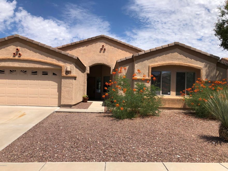 Spacious (2019 Sq.Ft.) Single Level home in cozy, convenient subdivision.  Move in ready with new carpet and Fresh Paint.  4 Bedrooms with roomy closet space.  Main Bedroom with spacious walk in closet and roomy bathroom.  Open back yard with views of the mountains and back up to a wash which is part of the lot size.
 Leman Academy Charter (K-8) school is nearby along with Walmart and Shopping. Hot water heater is 1 hear old.
