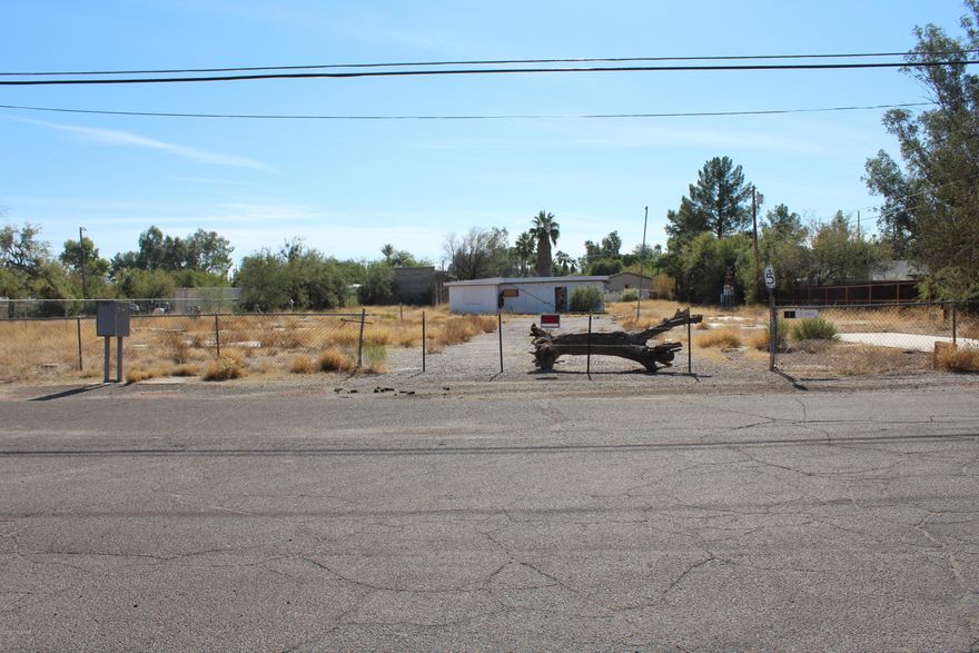 Highly Desirable Tucson Racquet Club Neighborhood! Great C1 zoned lot at the east end of Prince Rd. with incredible gorgeous panoramic views of the Catalina Mountains. Adjacent to the Rillito River Walk. Lot is graded and level on a paved street with electric, gas, water and telephone to the lot and sewer manhole in the street. This is the IDEAL in -town location for an upscale apartment complex, condo or townhome development. It would also be suitable for an office building or a retail site. One Listing Agent is related to Sellers.
