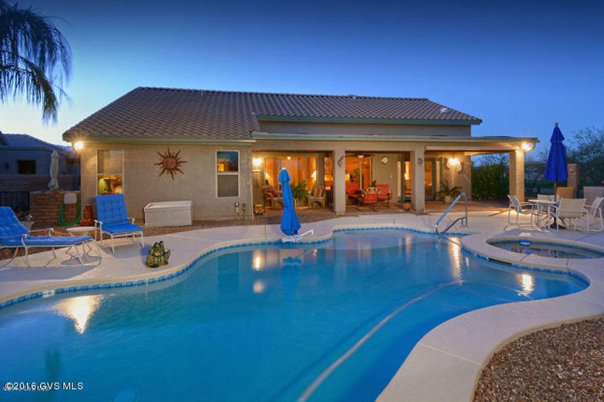 GORGEOUS home that has so many upgrades you will be AMAZED! Like living @ a resort within a resort community. Sparkling pool, spa, built in BBQ and private patio that has golf course and desert, mountain view. This can all be yours. Inside you have skylights, pull-out shelving in the cabinets, convection oven, gas range, under cabinet lighting, tile flooring. The list just goes on and on. Extended 2.5 garage that has room for golf cart. Must see this one for yourself!!