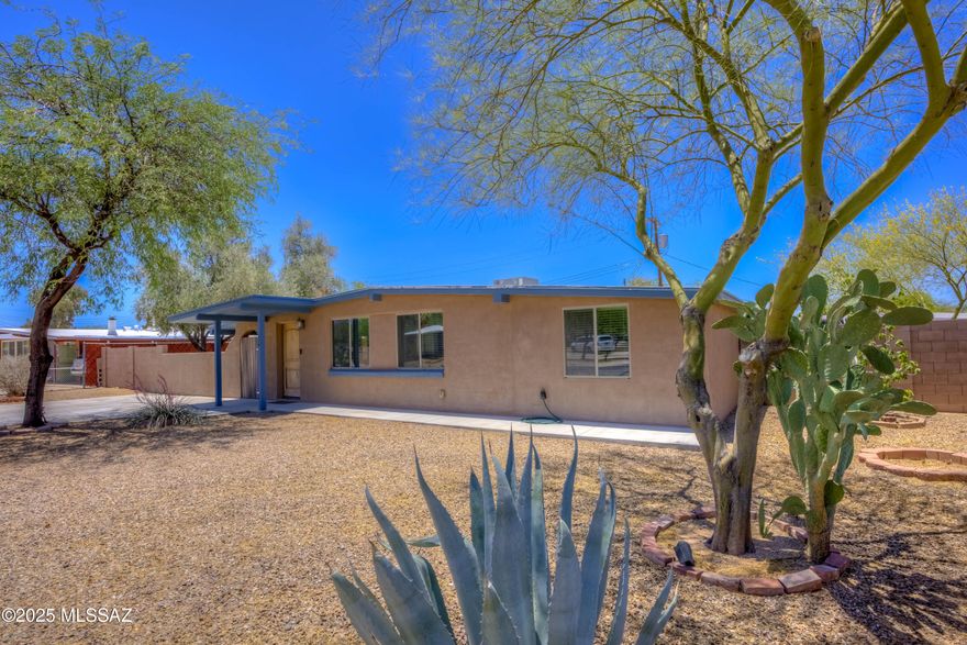 UPDATED three bedroom, two bathroom home just one block from Kellond Elementary, two blocks from Palo Verde Park in highly desirable Yale Estates! Prime Central location near shopping, bus lines, entertainment. No HOA, easy care yards on a large corner lot. Enormous yard size with private rolling side entry gate, plenty of shade and a large, high ceilinged outbuilding for toys OR workshop OR additional recreational living area... use your imagination! RV parking allowed. Interior has a stellar split bedroom floorplan with gorgeous cabinetry and countertops, laminate flooring throughout but carpet in bedrooms. Six panel upgraded doors and French doors to back patio. Hurry!