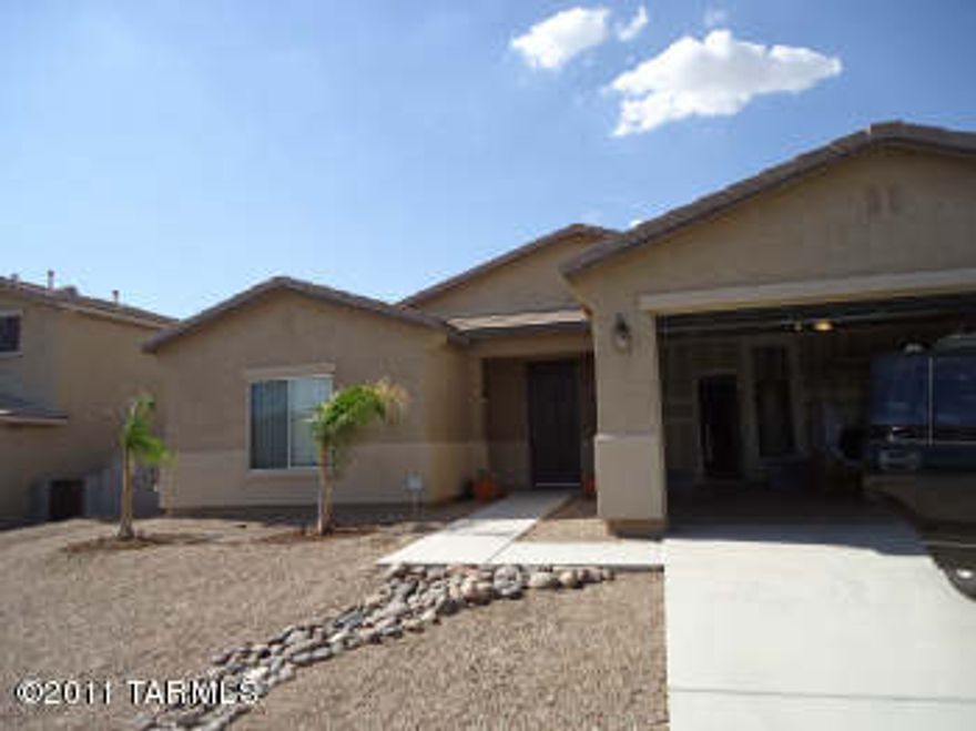 This is a 4 bedroom 2 bath home that backs up to desert and mountain views. It has a good sized lot with low maintenance landscaping. the floor plan is spacious and open. Close to Arizona Pavilion and the premium outlet mall.