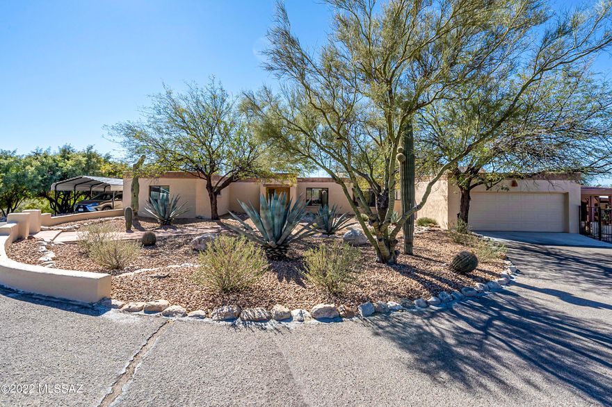 Set far off Campbell this Beautiful Ridgetop home in coveted Catalina Foothills estates
offers mountain views with a Guest quarters. Main house has 4 bedrooms that include 2
master bedrooms, family room, separate living and dining room with dual updated
fireplace. Newly updated kitchen has granite counter tops with 5 burner gas stove and
French door refrigerator. Freshly updated paint, flooring and baths. Separate covered
potting area for the garden enthusiast. Large new heated Endless Pool Spa conveys with
property. Large low-care backyard with covered patio. Newly coated roof, new AC units