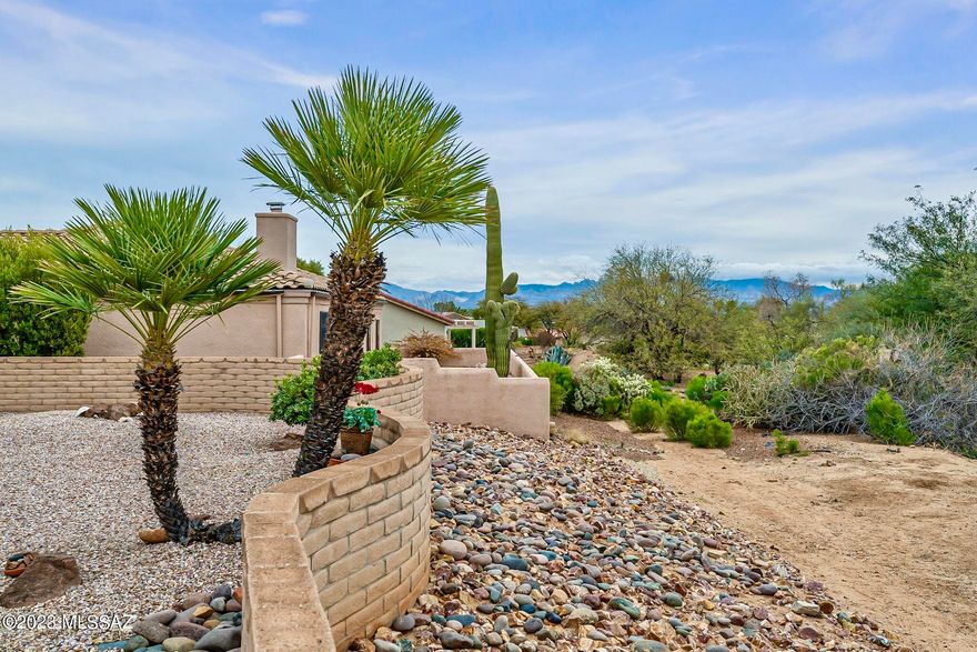 Welcome to another Green Valley GEM in the quiet, peaceful, & beautiful Portillo Place Subdiv. A small enclave of 28 homes developed by a quality & reputable home builder- Pierce Homes, known for the Fine Art of Living Well & LIVING WELL you shall! This home offers a private, calming, & serene bkyd where you can sit, relax, & enjoy the beautiful AZ Desert. Inside you'll be pleased to find an impeccably maintained 3bed/2bath home w/features incl. a charming & cozy lvng rm w/beehive fireplace, plantation shutters on kitchen windows, skylights, SS appliances, lazy suzan, pull out drawers, built in storage in ldry rm & garage, utility sink, water softener, walk-in shower & closet in the primary, beautiful ceramic tile throughout, split floor plan, and completley move-in ready! Plus, this home is part of GVR which means you'll have access to all 14 recreation centers incl. an award-winning, 24-court pickle ball center! The social activities & recreational opportunities available through GVR are endless!! So, if you're searching for a friendly, peaceful yet vibrant active adult community, look no further. 
Did I mention this home offers a transferrable termite warranty, HVAC maintenance plan, and can be purchased partially furnished? Don't wait, schedule your showing today!