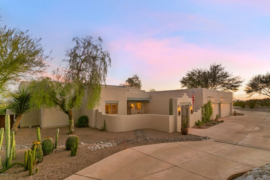 Welcome to Green Ridge! Located in an exclusive, gated community of only 38 homes, this beautiful southwestern style property features a 4 bedroom/2.5 bathroom split floor plan, and is situated on 1.64 acres. Saltillo tile throughout, custom interior paint, and high ceilings with exposed viga beams truly brings this Tucson home to life. Additional distinctive characteristics include a 3-car garage with a dedicated workshop area, front courtyard entry, and mature desert landscaping. 

Relish the remarkable views of the Rincon Mountains and Tanque Verde Valley from the full length covered patio - and enjoy a dip in the Pebble Tec pool & spa.

Contact us to schedule your private showing.