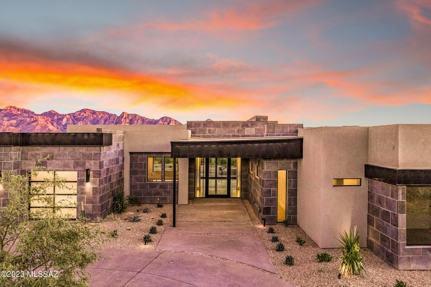 MOVE INTO YOUR DREAM HOME NOW! Enjoy entertaining in your new home with spectacular Catalina Mountain views throughout. With an abundance of natural light & a layout for easy living & entertaining, the floor plan includes a large multi-slide rear door, dramatic high ceilings, double island kitchen with all Thermador appliances & a separate bar off the great room with Sub Zero wine refrigerator. Optional 602 sf Guest House already designed. Enjoy resort like living in the private community of Stone Canyon with World Class Golf Course designed by Jay Morrish & ranked in the Top 100 Golf Courses in America.