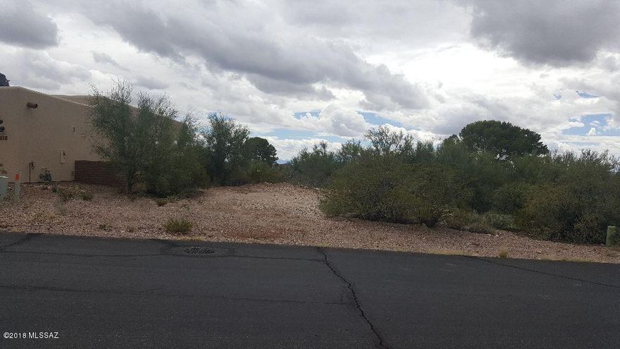 Land located on a paved road/enjoy use of a recreation center/pool/tennis and much more.
Association fee is $70/ The lot has great Mt Views of the Tucson Estates golf course and is located in a cul-de-sac