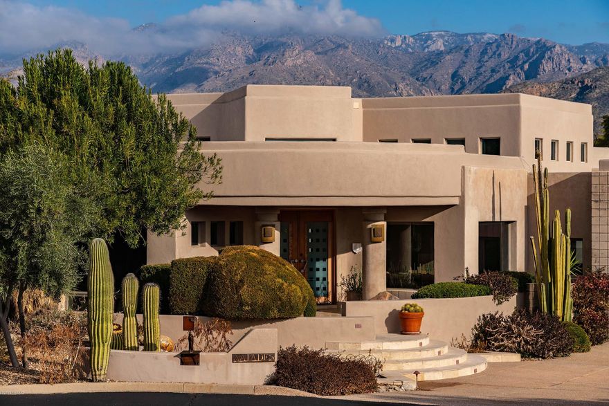 Superbly built 3BD 4BA soft contemporary, fully furnished retreat with an oversize lot tucked inside the tranquil grounds of the world renowned Canyon Ranch Wellness Resort, Immerse yourself in a year round privileged Life style with access to first class resort amenities. State of the art Spa, round the clock fitness classes, outdoor activities, tennis, pools and wellness treatments all at your figure tip. Lori Caroll Digns touch are in full evidence in this architectural gem. Edged glass doors greets you into a majestic high ceiling great room with floor to ceiling panoramic window inviting breath taking mountain views. Great room boasts a built- in entertainment center, travertine tiles, dining nook. Flawlessly opens into a chef's kitchen with a large granite top counters, stainless steel appliances. Separate dining room with a view of cactus and Sonoran landscape, Separate cozy living room off of the great room.. two gentle steps takes you to a spacious master suite with an intimate fire place, floor to ceiling view of the mountains,. Spacious master suite bathroom. Plus two additional master bathrooms in the other two bedrooms. Enjoy relaxing in the backyard along the waterfalls and the spa, Bbq and outdoor kitchen makes for great outdoor entertaining.