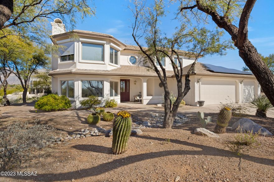 Tucked away in a secluded cul-de-sac. On 41,817 sqft., lot with 3-car garage and Tesla charging station, owned solar, 4 bedrooms, 3 bathrooms, office/den and a sprawling private yard with pool, spa and mountain views. Enter the home to a light and bright formal living room to the left and a sun filled formal dining to your right. Spacious kitchen with custom copper hood, leading to breakfast nook and the large family room with fireplace.
The primary suite is appointed with a wood-burning fireplace, walk in closet, separate vanities, jetted tub & shower. View balcony is located off the primary suite. Three large secondary bedrooms with natural light. Close to Whole Foods, Basis North campus, Gregory School, TMC.