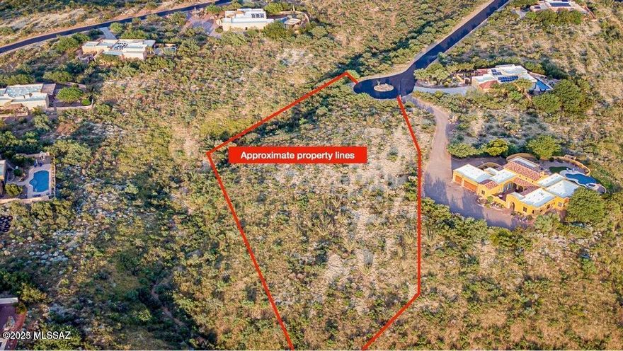 Stunning 2.61 acre lot in gated & desirable Green Valley community of Madera Foothills Estates. This cul-de-sac lot offers amazing views in every direction & privacy. Build your dream home on this large parcel and still be close to everything Green Valley has to offer. Community is part of the Green Valley Recreation.