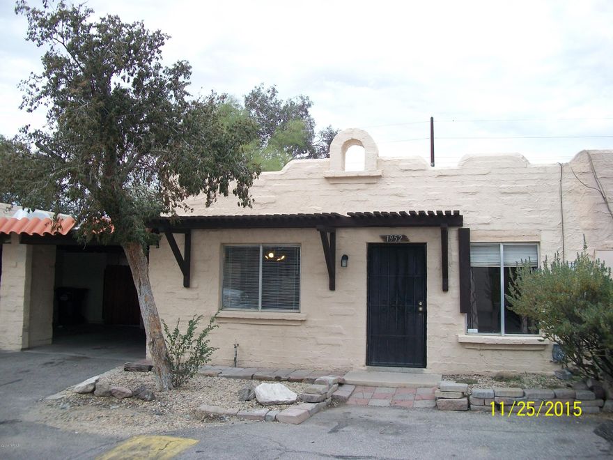 Great Townhouse with mountain views! Beehive fireplace in living room is a nice touch. Large eat-in kitchen give you lots of room to cook and ample storage. Large covered patio in the back offers room to relax and view the mountains. Oversized 1 car carport and a large storage / workshop room offers the washer and dryer hookups.