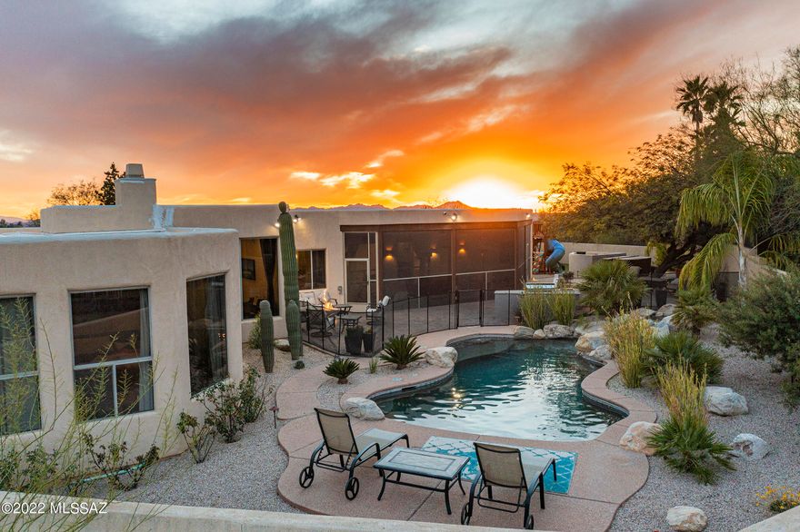 Breathtaking views of Finger Rock await you at this custom  home. Mountains views are captured from almost every room. Newly renovated kitchen, bathrooms, new built-ins in FR and LR. Open floor plan with high ceilings, formal dining room, living room with a fireplace, gourmet kitchen with  island, granite countertops, new S/S appliance, walk -in pantry, eating-in kitchen with views, travertine floors. MB with sitting area and fireplace, with adjacent bonus room. Large MB with jacuzzi tub, separate sinks, custom his/hers closets. Spacious guest suite with its own  entrance and full BA. A screened AZ room that takes you out into a  recently upgraded back yard with built in BBQ, kitchen, play area with turf, fire pit, gas heated pool, waterfall, above ground spa, and so much more!