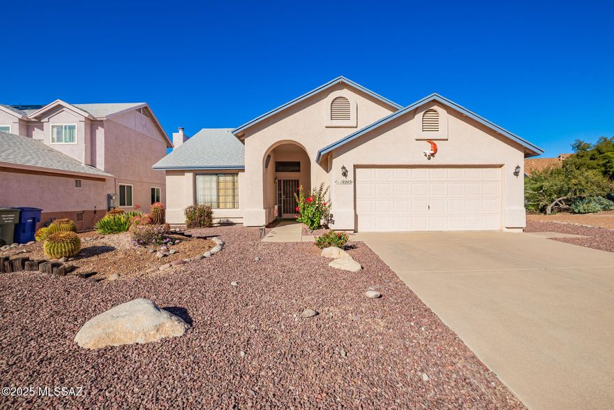 Welcome to this charming East Tucson retreat, ideally situated on a premium cul-de-sac lot! Offering over 1,200 sq.ft. of well-designed living space, this delightful home features 3 bedrooms, 2 bathrooms, and a cozy living room complete with a warm fireplace. The bright, functional kitchen comes equipped with a range, dishwasher, , and refrigerator—ready for everyday living or entertaining. The inviting primary suite includes an ensuite bathroom with dual vanity and a generous walk-in closet. Step outside to enjoy a spacious, north-facing backyard that backs to open space, featuring mountain views and a relaxing covered patio, perfect for outdoor dining or peaceful evenings. With a 2023 energy-efficient HVAC system, you'll stay comfortable year-round. Conveniently located near shopping, dining, schools, recreation, and easy freeway access, this wonderful home is truly a MUST SEE!