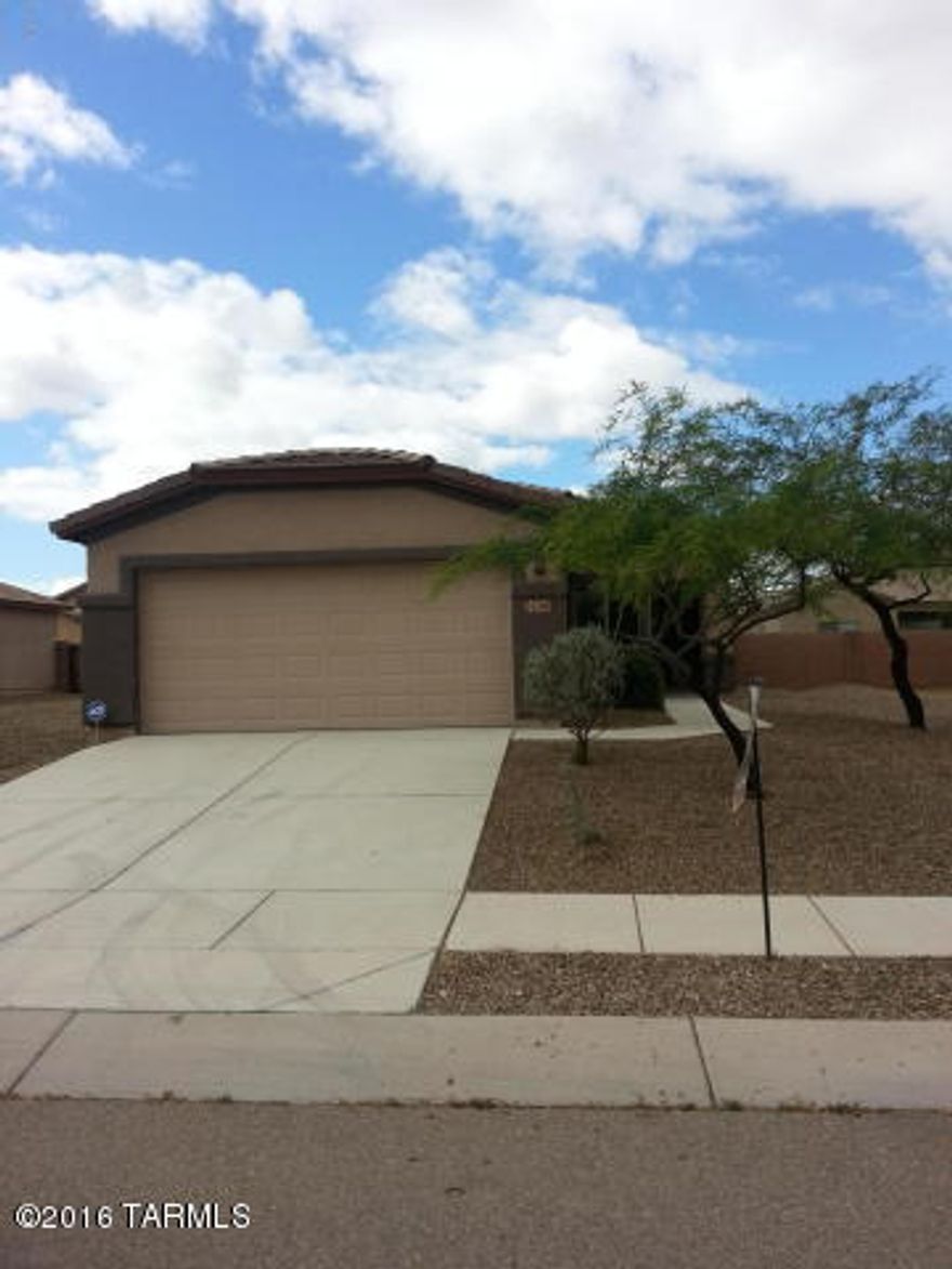 Beautiful 3 bedroom/2 bath. Features vaulted ceilings and custom paint throughout, stainless steel appliances. Tile throughout the house except in the bedrooms. Spacious backyard and 2-car garage.