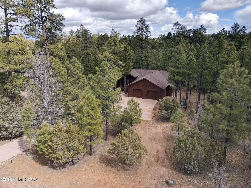 Torreon in Show Low offers 36 holes of golf, cooler temperatures, and a clubhouse and amenities. This cabin came fully furnished. Home has open floor plan with view of the forest with tall pines. Large extended covered back deck with a gorgeous view. Area is private but still close to all activities, shopping and community features. Community has fitness center, outdoor heated swimming pool, hot tub, Clubhouse & Grill restaurant, The Cabin restaurant, a 10 acre Family Center, equestrian center, golf course, golf pro shop and more!