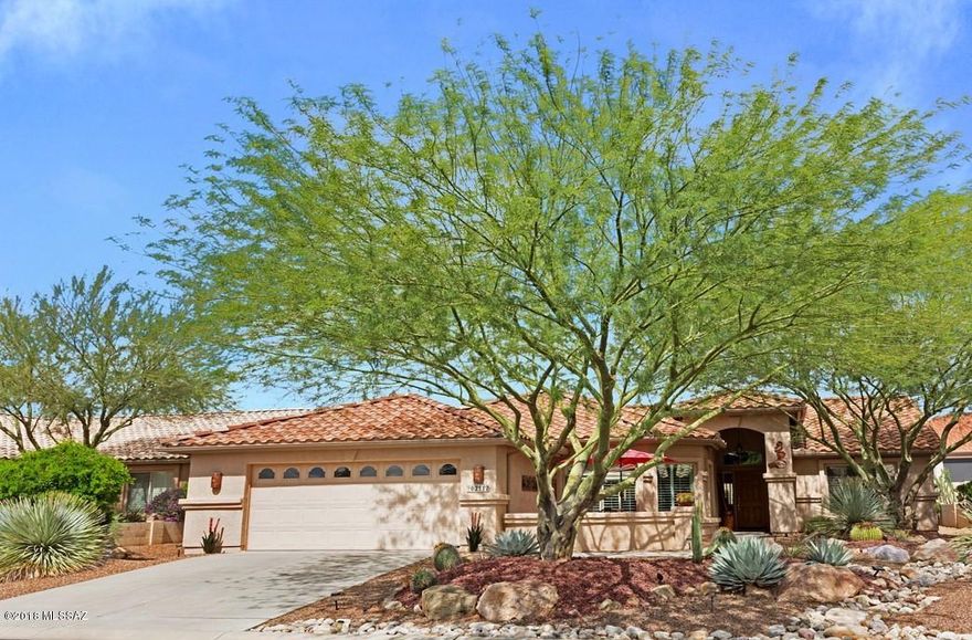 Must See Wonderfully Updated 2006 Laredo. Kitchen Has Stainless Steel Appliances (Sept. 2018), Maple Cabinets with Pullouts, Pendant Lights, & Brushed Nickel Fixtures. Expanded Dining Area with Views.  Upgraded Lighting & Plantation Shutters Through-Out.  Tiled Showers. Irrigation Replaced (2014), Laundry Room with Matching Maple Cabinets & Newer Washer/Dryer.  Expanded Garage with Utility Sink & Water Softener Loop.  Enjoy Indoor & Outdoor Living.  Entertain Under Your Covered Patio or Around Your Kiva Fireplace with Custom Cobblestone Patio with Built-in Seating with Mountain Views.  Watch the Mountains from Your Front Courtyard too.  SaddleBrooke is Tucson's Premier Active Adult Community Offering 100's of Clubs, 63 Holes of Golf, Tennis, Pickle Ball, 5 Restaurants & more.