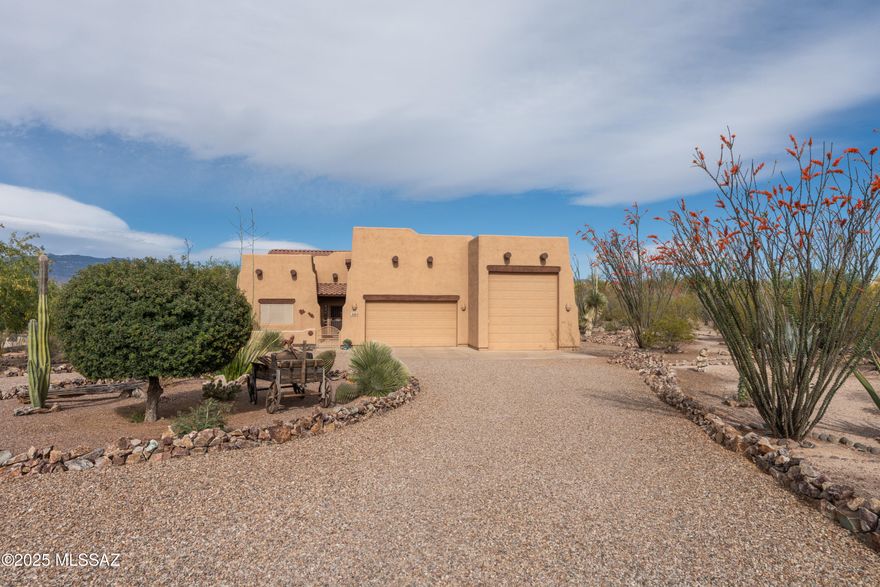 Tucked away in the highly desirable Antler Crest community, where homes are rarely available, 8963 S Placita Asta Vieja offers a breathtaking blend of comfort, style, and privacy. Nestled on 1 acre in a quiet cul-de-sac, this desert sanctuary delivers tranquility and convenience.  Experience gorgeous panoramic mountain views with nearby trail access for outdoor enthusiasts. 
This gem features high ceilings, expansive windows, and an open, airy feel. The great room invites you to relax by the cozy fireplace, while the tile floors keep the space cool and stylish.
The chef's kitchen is a showstopper, showcasing custom cabinetry, sleek Silestone countertops, stainless steel appliances, and breathtaking views from the dining area window.
The split-bedroom design ensures privacy, with the