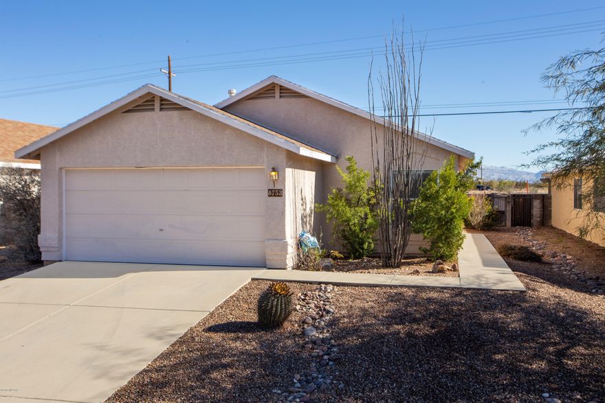 Fantastic Rita Ranch home with Great Room/Vaulted Ceiling. Kitchen has extra upper cabinets for storage.  Easy care tiled living area.  Master bedroom has large walk in closet. Split floor plan with Master bedroom off of living area. Water softener and finished garage.  Mountains views in rear yard.  Outdoor fireplace with paver patio.