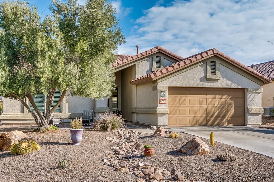 This ''Augusta'' model offers an open great room floorplan, 2 Bedrooms, plus den. The kitchen has been upgraded with siltstone counter tops, under cabinet lighting, & backsplash. Other features included beautiful tile floors, den with built-in desk, window shutters, speckled garage floor, and extended garage. All you have to do is move in and enjoy this PRISTINE home!