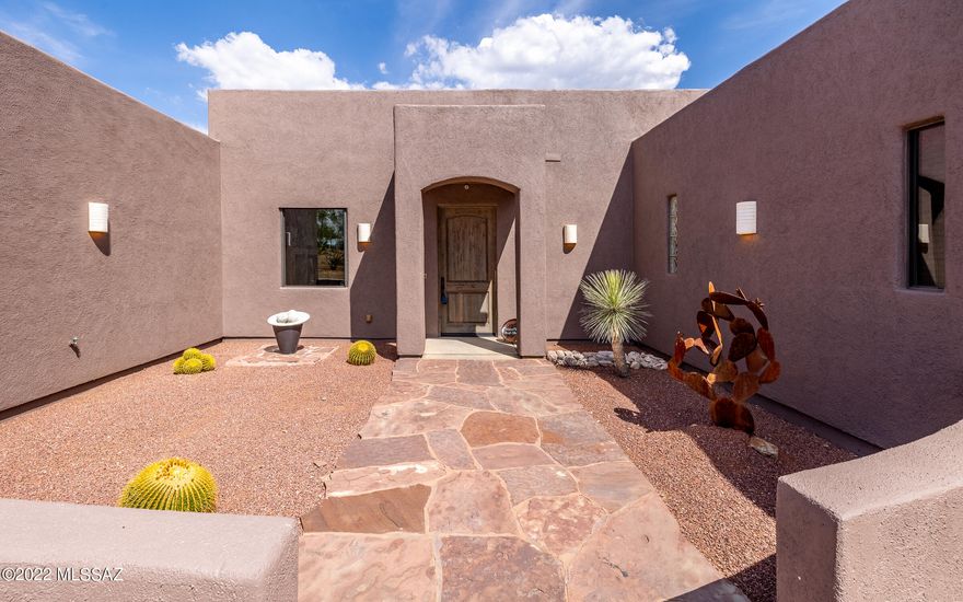 This Gorgeous custom home with 3 car garage is on 1.25 acres and has amazing mountain views from the large picture windows (with retractable privacy shutters). You'll also appreciate the Chef's kitchen with granite counters, center island, custom solid wood cabinets and an open concept ideal for entertaining! Other highlights of this split floorplan include two master suites, all bedrooms have walk-in closets and the home is handicapped accessible. This custom home offers lots of flexibility with office and bonus room and open backyard ready for the new homeowners imagination!